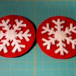 Two sample models with appliques stitching completed