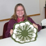A smiling Linda with her  Leaf Snowflake #3 topper