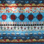 A closer look at the fabrics along with the pieced strip