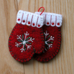 One pair of brightly colored mittens - stitched and beaded!