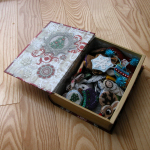 'Book box' shown open and holding ornaments - should I line this with felt???