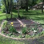 Our inground garden from the driveway view